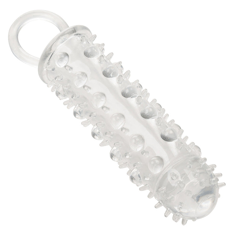 Clear textured penis extension sleeve with closed and and scrotum loop on a white background