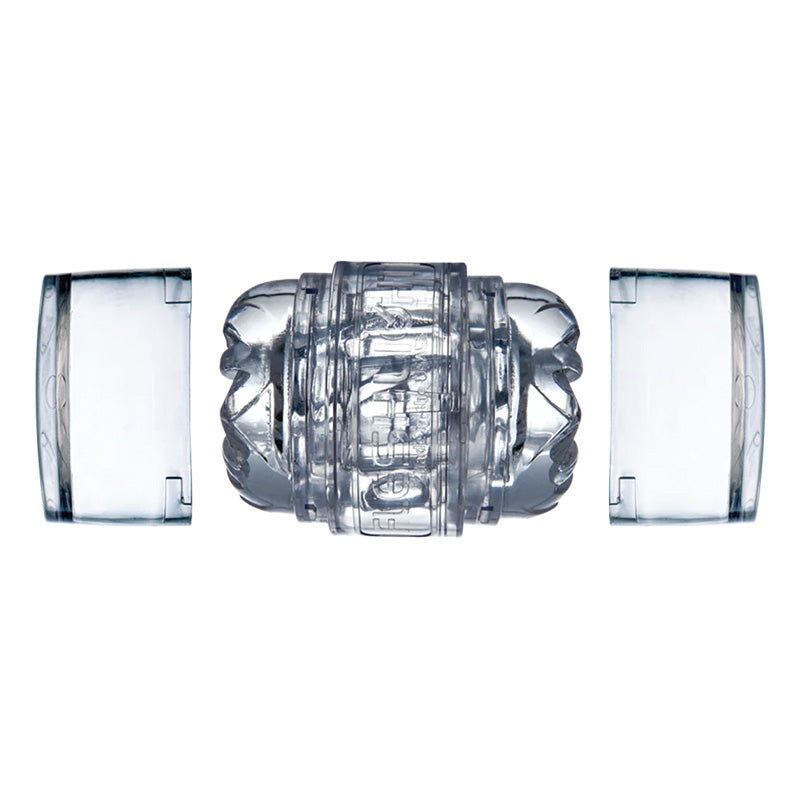 Clear Fleshlight Quickshot Vantage laying horizontally with both end caps removed