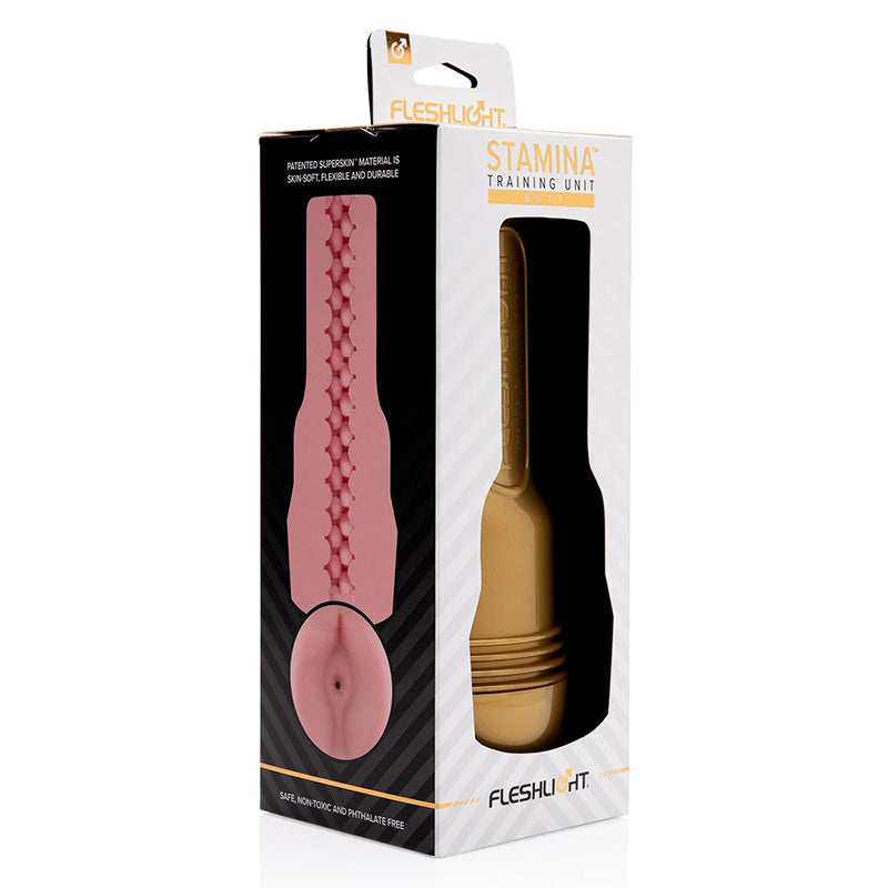 Fleshlight Stamina training unit packaging showing gold Fleshlight in product viewing window and cross-section of bumpy sleeve texture on a white background