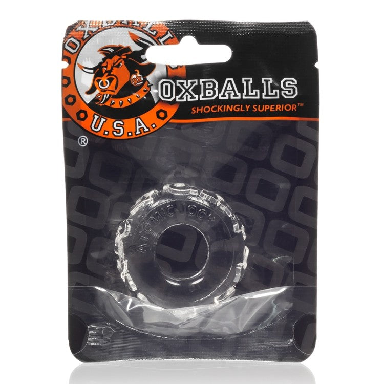 Plastic packaging with Oxballs branding containing a clear textured cock ring