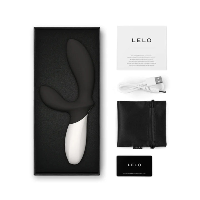 Black LELO Loki Wave 2 with packaging, USB cable, warranty card, and quick start guide on a white background