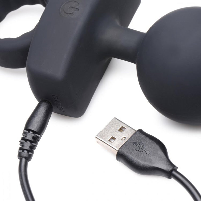 Close-up of XR Brands AG787 21X Dark Rattler Vibrating Silicone Anal Beads with Remote charging port and USB cable