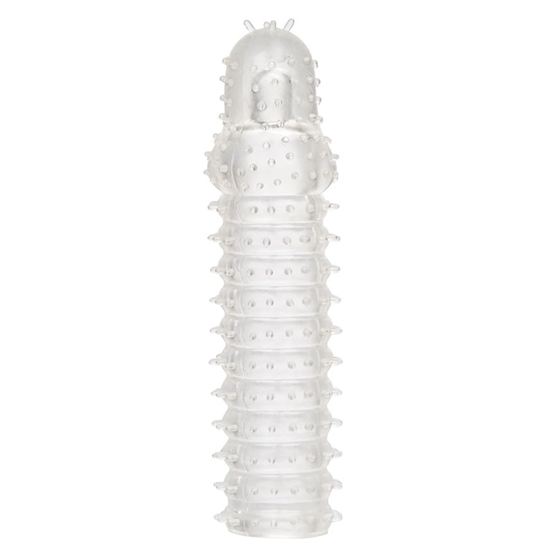 Clear textured penis enhancement sleeve on a white background