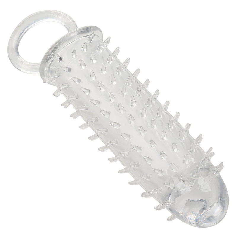 Clear textured penis extension sleeve with closed and and scrotum loop on a white background