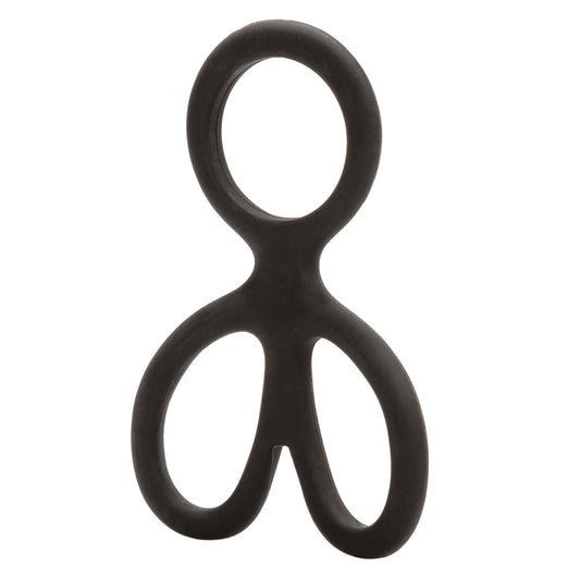 Black silicone ball spreader on a white background