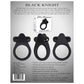 Back of Black Knight vibrating silicone cock ring packaging with product details on a grey background