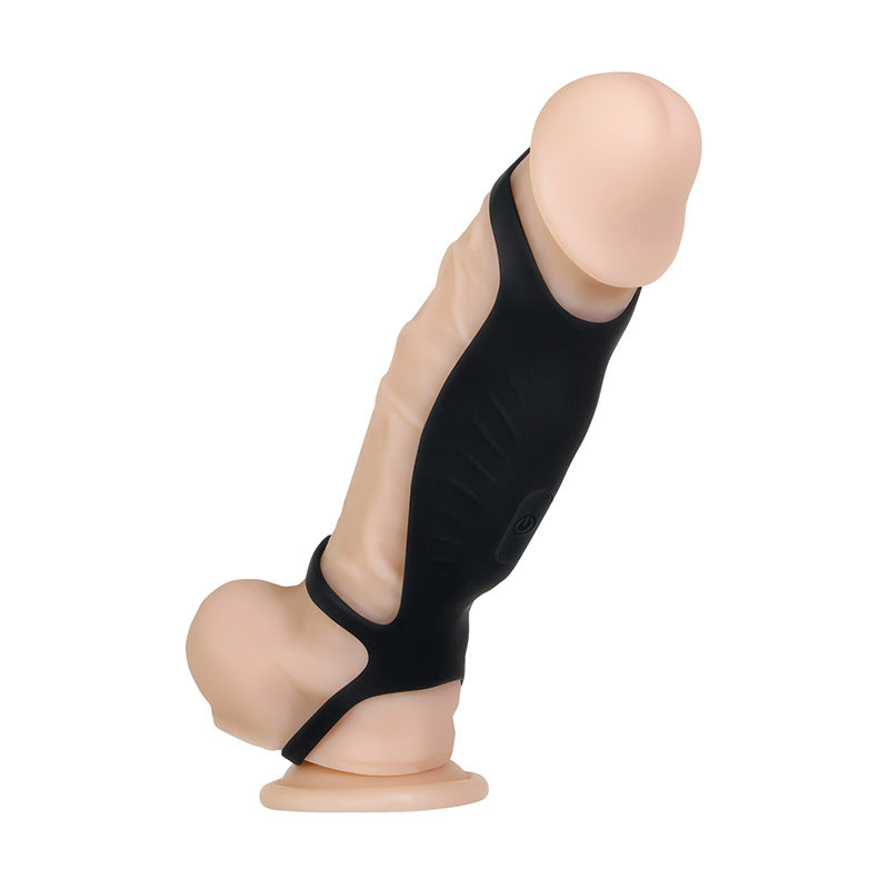 Black Gender X Rocketeer silicone cock sheath over realistic beige dildo