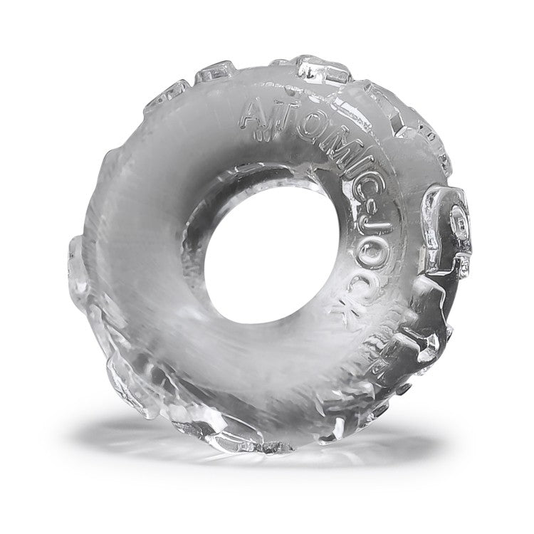 Clear textured jelly cock ring with 'Atomic Jock' lettering on a white background