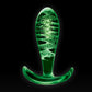 NS Novelties NSN-0491-51 Firefly Glass Ace butt plug glowing green on a black background