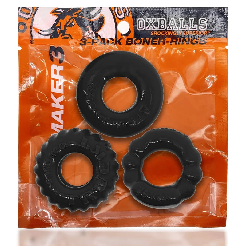 Three black Bonemaker cock rings in a clear plastic package with orange and white Oxballs branding.